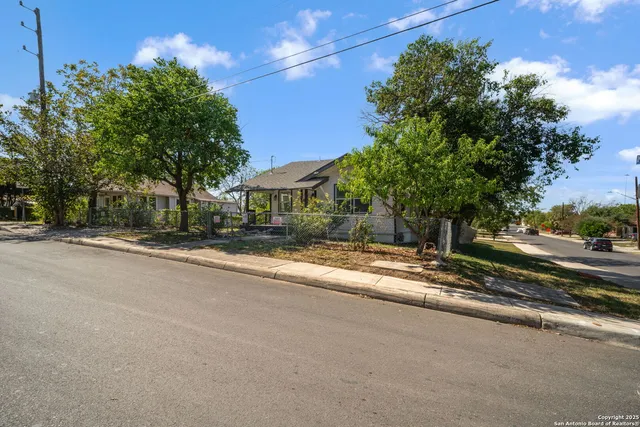 a view of street along with trees