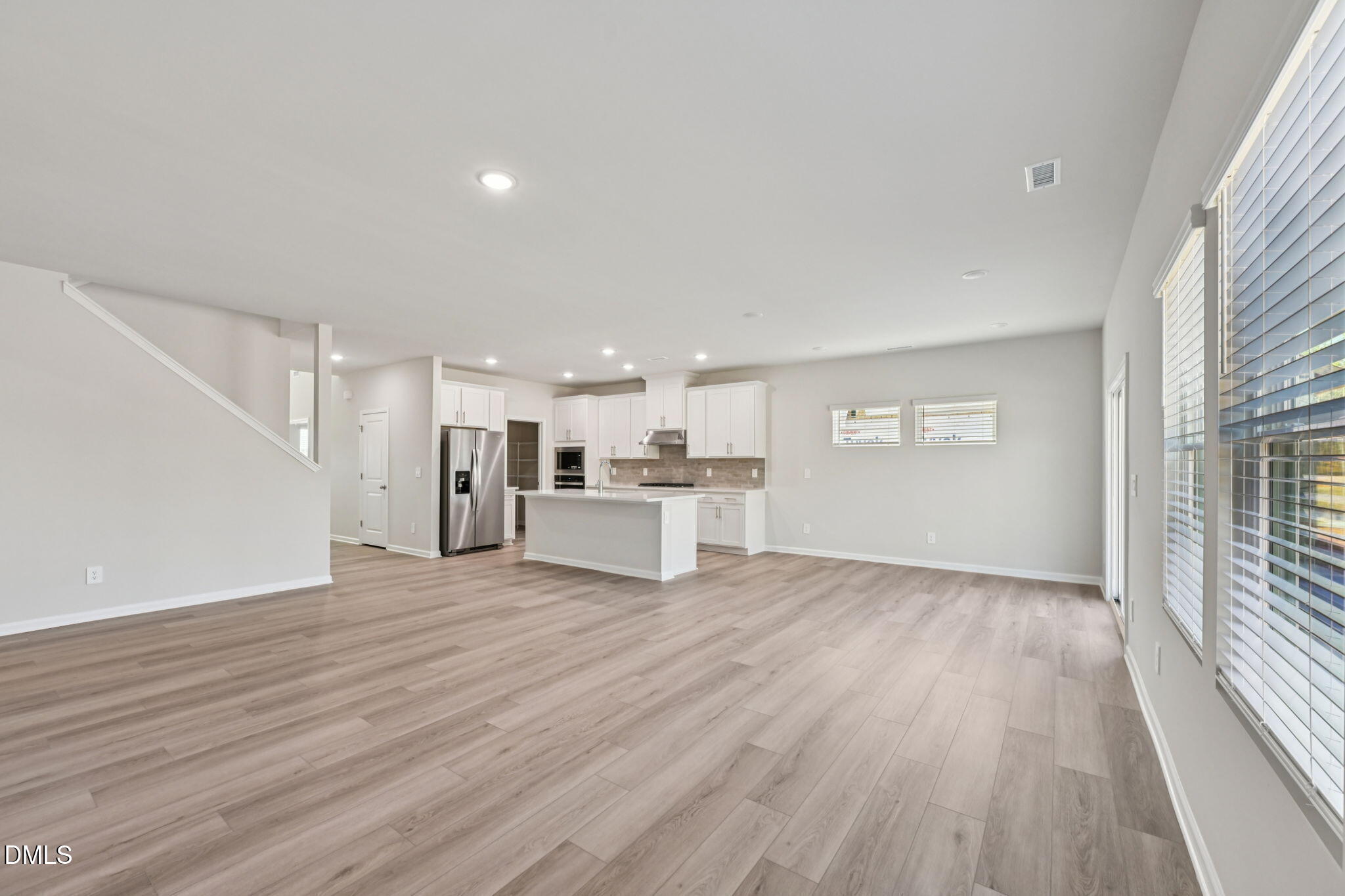 2145 Topsail Road Durham, NC 27703 - Photo 8 of 49 a view of a kitchen with wooden floor and a window