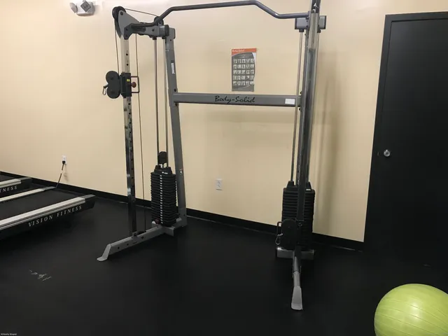 a view of a room with gym equipment