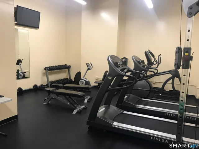 a view of a room with gym equipment