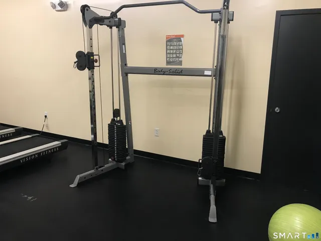 a view of a room with gym equipment
