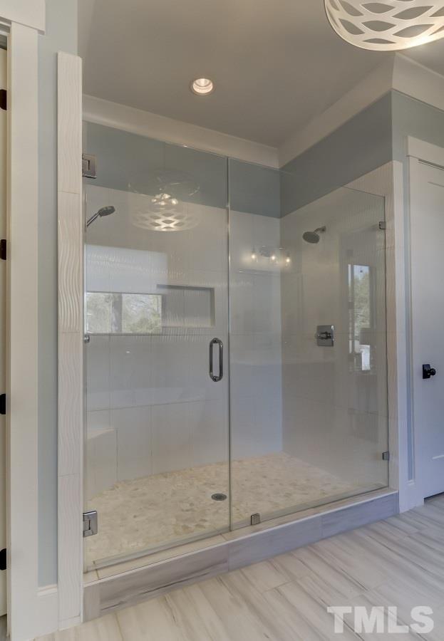 503 Peebles Street Raleigh, NC 27608 - Photo 14 of 30 a bathroom with a shower