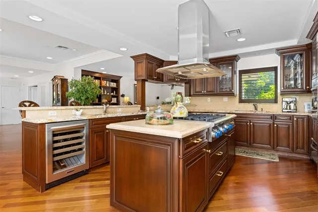 a kitchen with a sink and stove