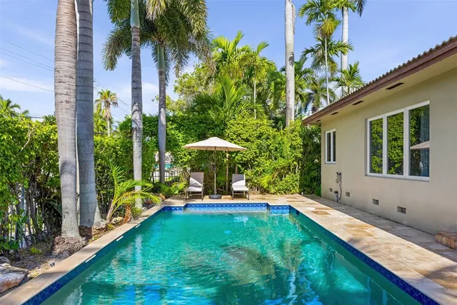 a house view with a garden space