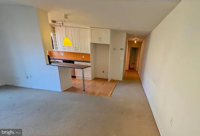 a room with furniture and a window