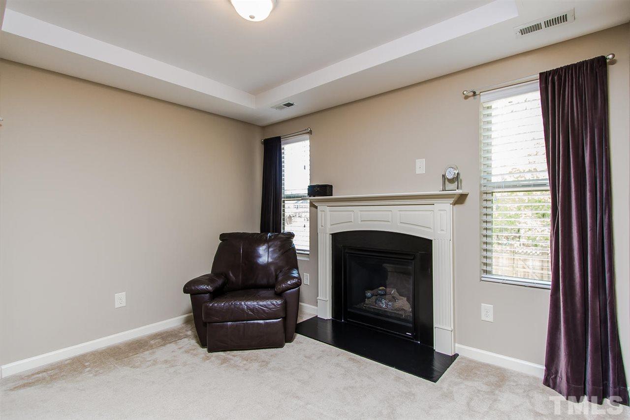 1401 Ranchester Road Knightdale, NC 27545 - Photo 15 of 24 Cozy up to your gas log fireplace in your master sitting room.