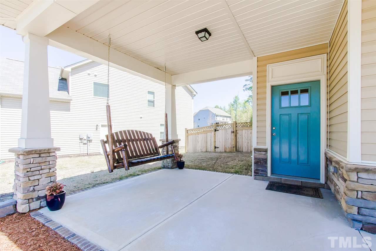 1401 Ranchester Road Knightdale, NC 27545 - Photo 3 of 24 Enjoy the summer breezes on your wrap around front porch!