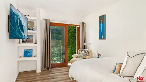 a bathroom with a sink vanity and a mirror
