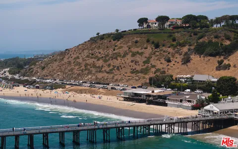 a view of a lake with a mountain in the background