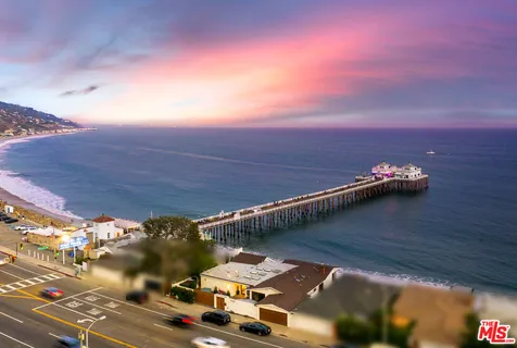 a view of a city with a lake