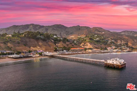 a view of a lake in middle of a town