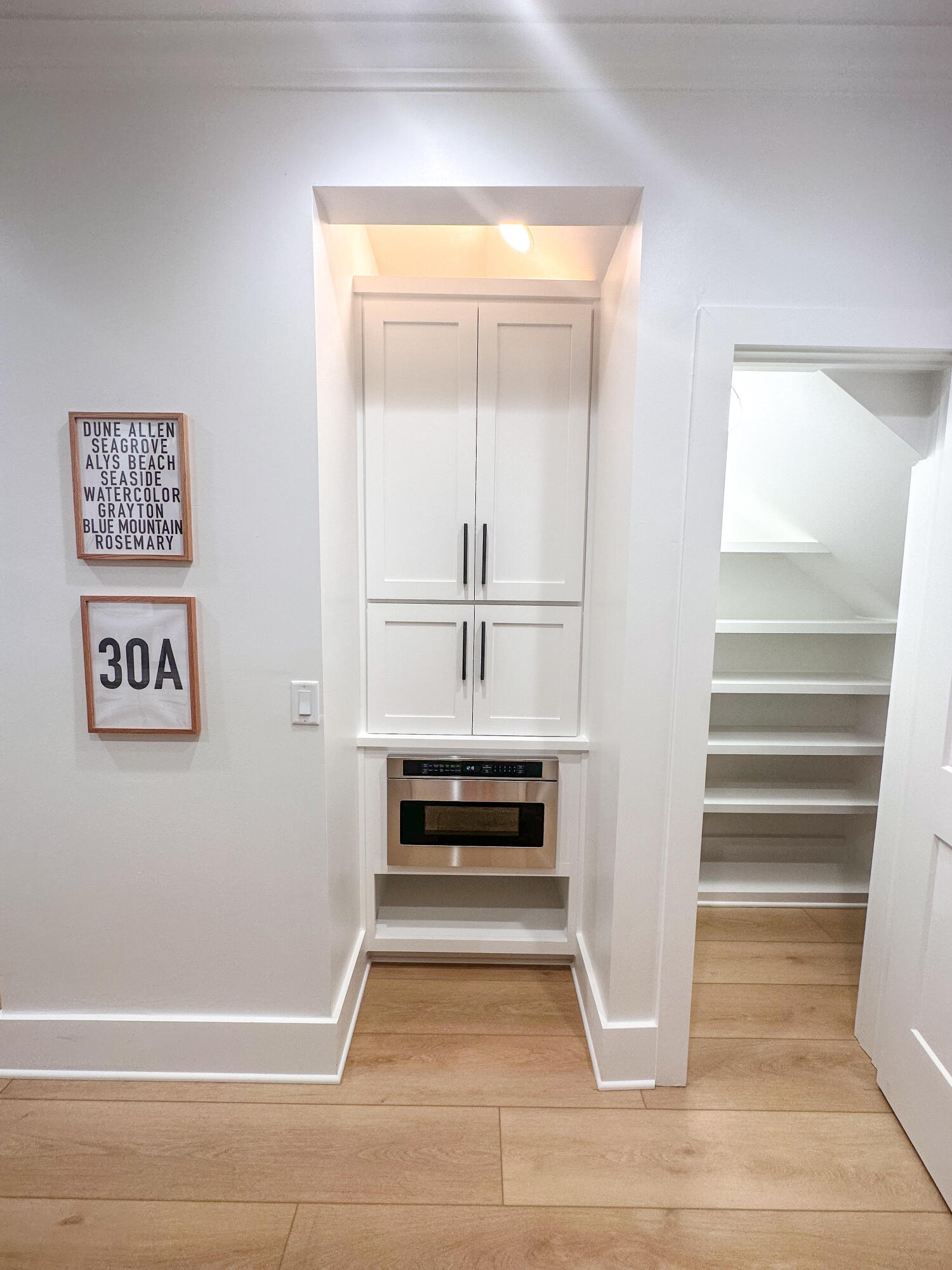 48 Rue Du Soleil Santa Rosa Beach, FL 32459 - Photo 12 of 37 a view of an empty room with wooden floor and window