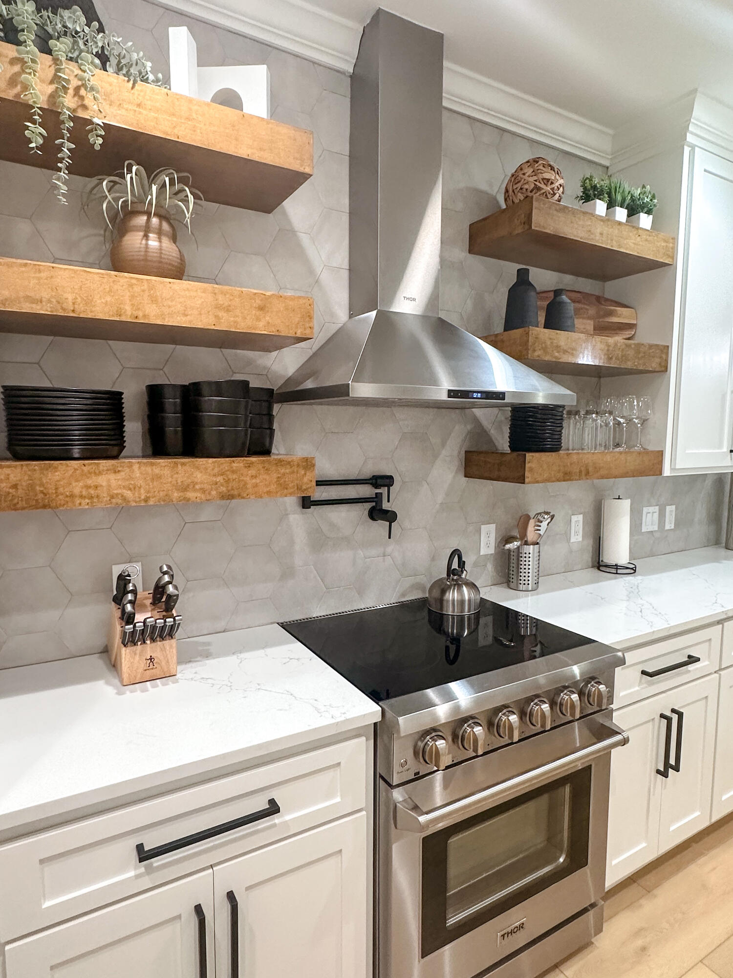48 Rue Du Soleil Santa Rosa Beach, FL 32459 - Photo 15 of 37 a kitchen with a stove and cabinets