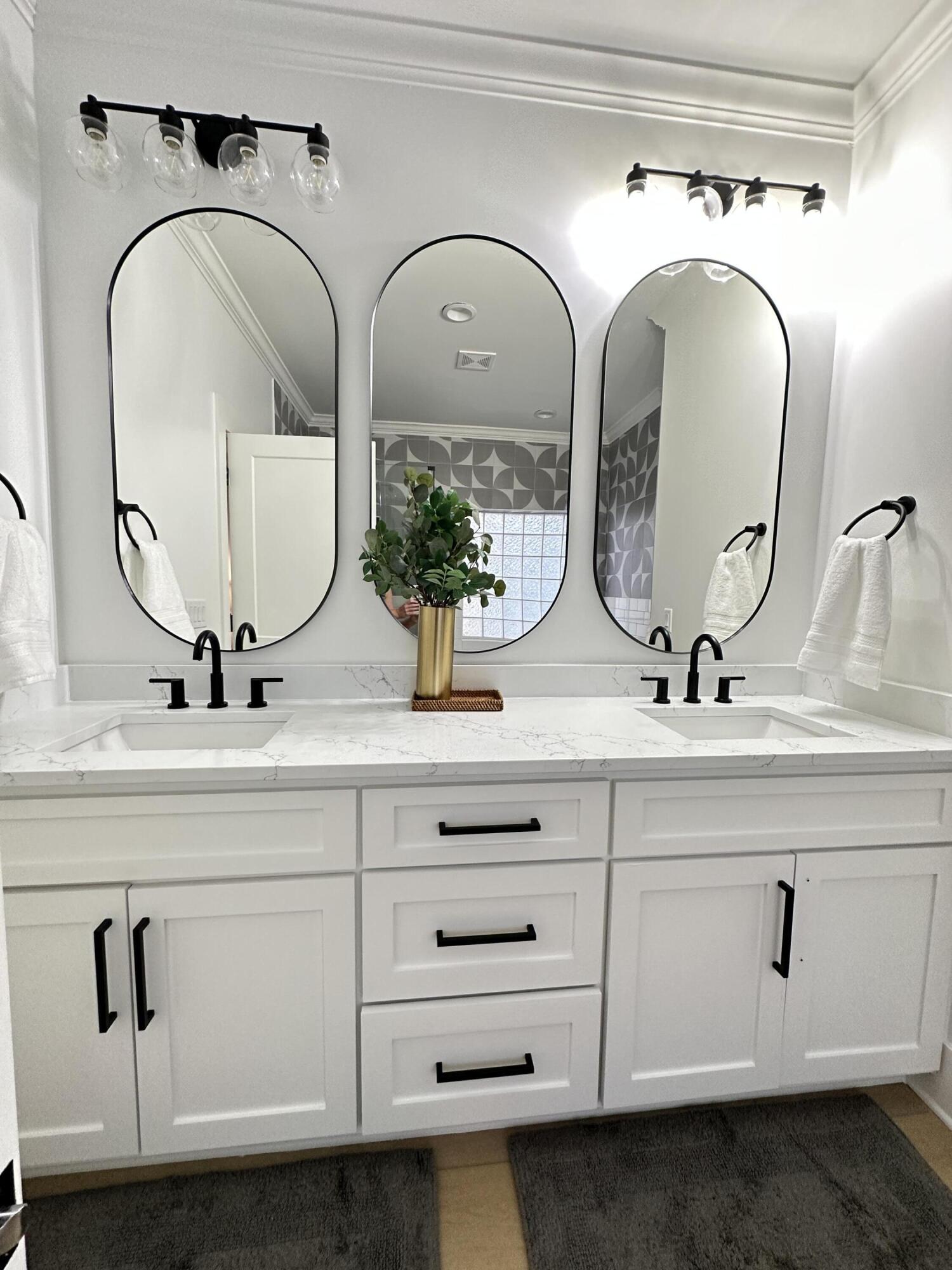 48 Rue Du Soleil Santa Rosa Beach, FL 32459 - Photo 25 of 37 a bathroom with sinks and mirror