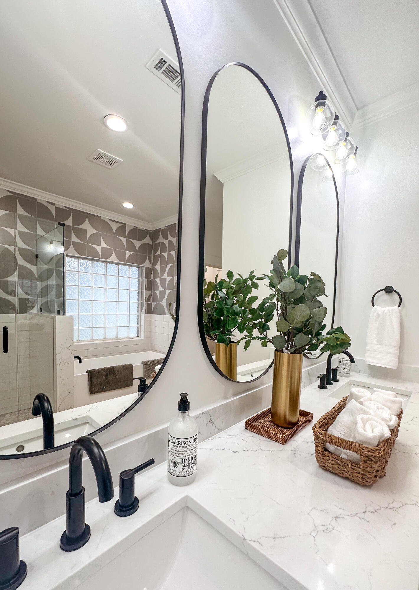 48 Rue Du Soleil Santa Rosa Beach, FL 32459 - Photo 26 of 37 a view of a bathroom with a sink and mirror