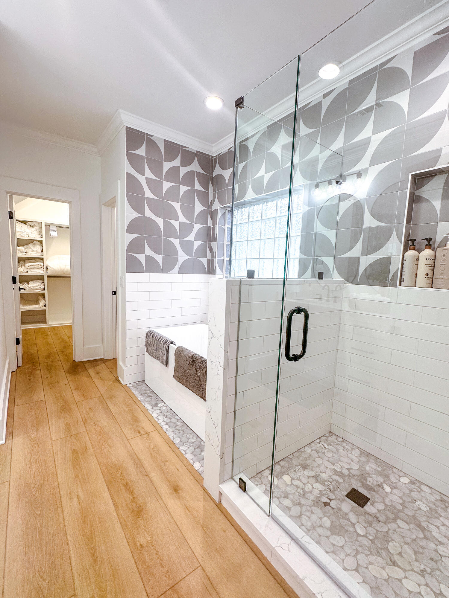 48 Rue Du Soleil Santa Rosa Beach, FL 32459 - Photo 32 of 37 a bathroom with a sink and a glass door shower