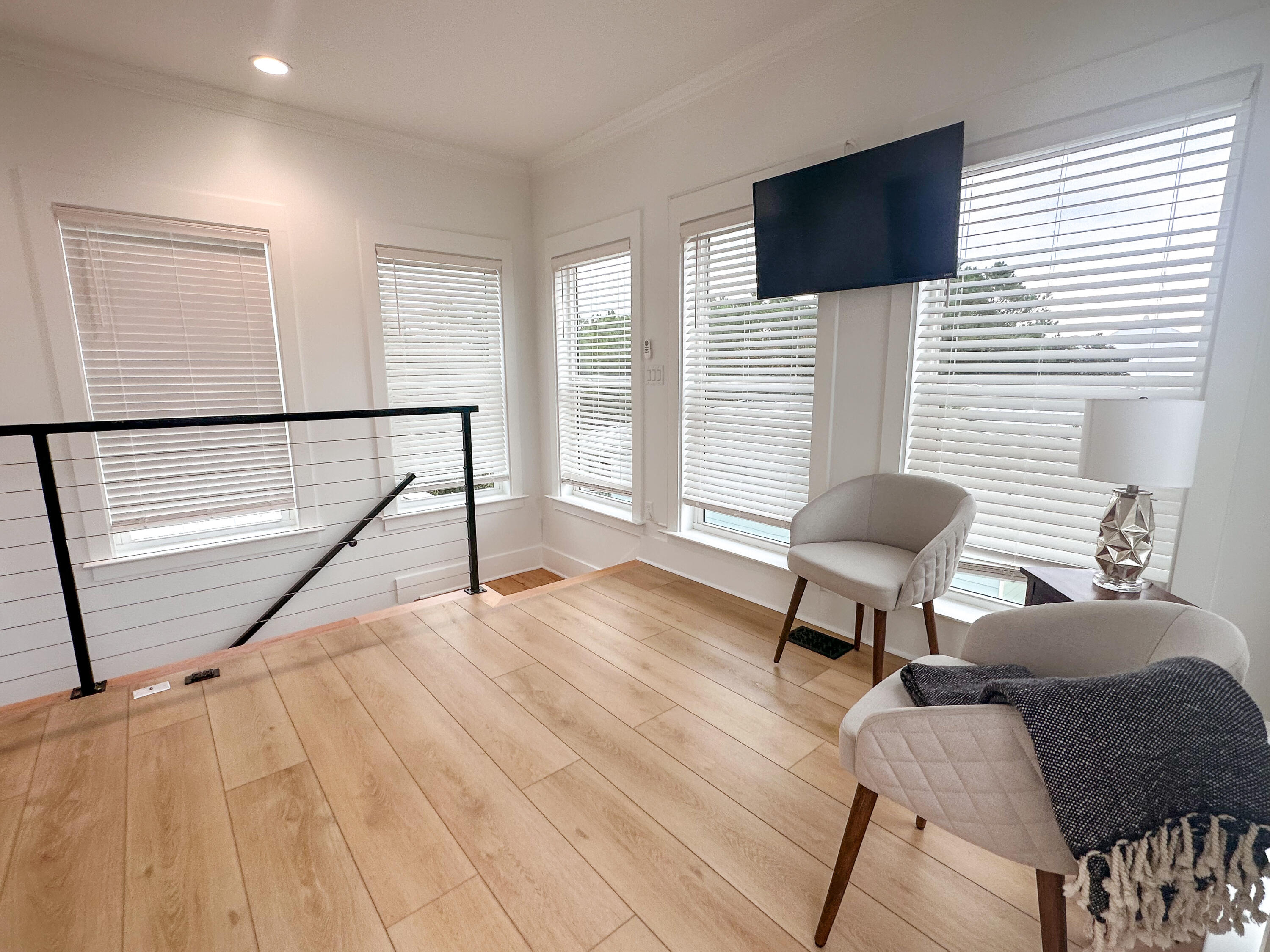 48 Rue Du Soleil Santa Rosa Beach, FL 32459 - Photo 36 of 37 a living room with furniture and a flat screen tv