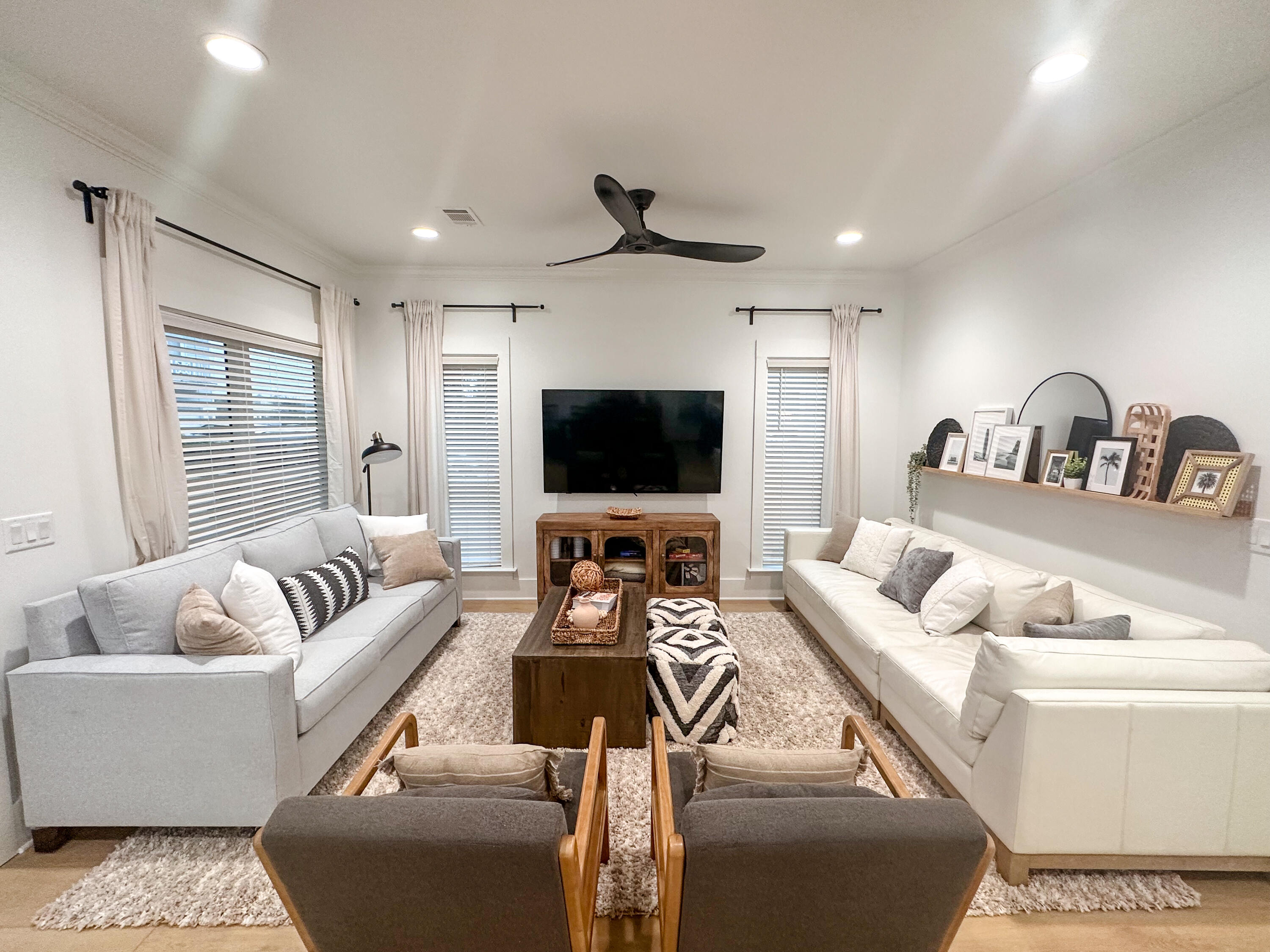 48 Rue Du Soleil Santa Rosa Beach, FL 32459 - Photo 7 of 37 a living room with furniture and a flat screen tv