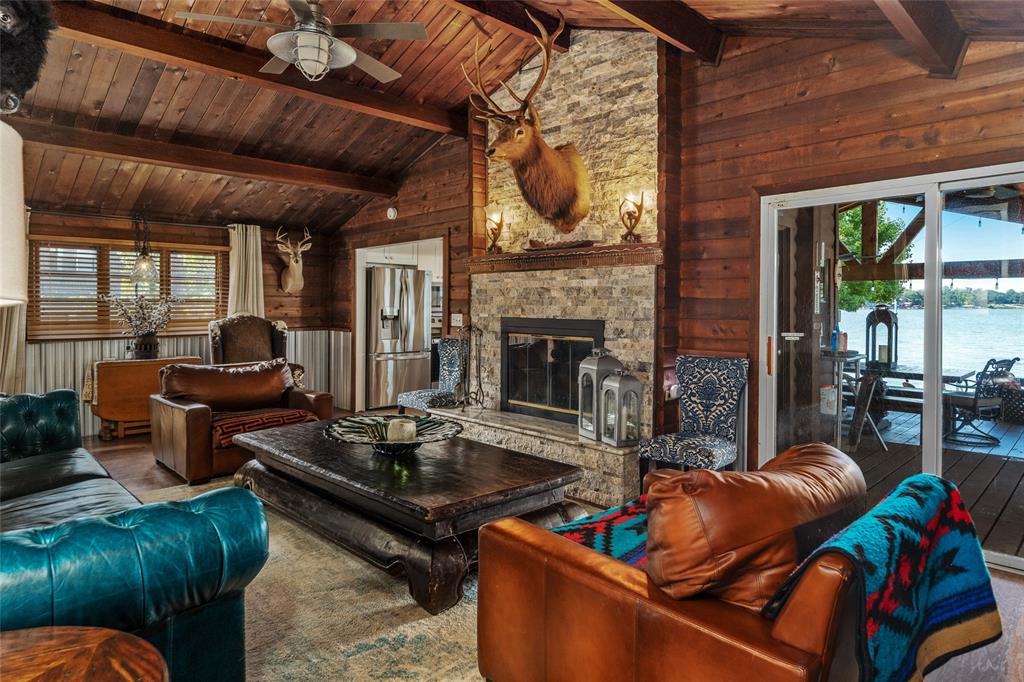 309 Shore Line Drive Tool, TX 75143 - Photo 4 of 23 a living room with furniture and a fireplace