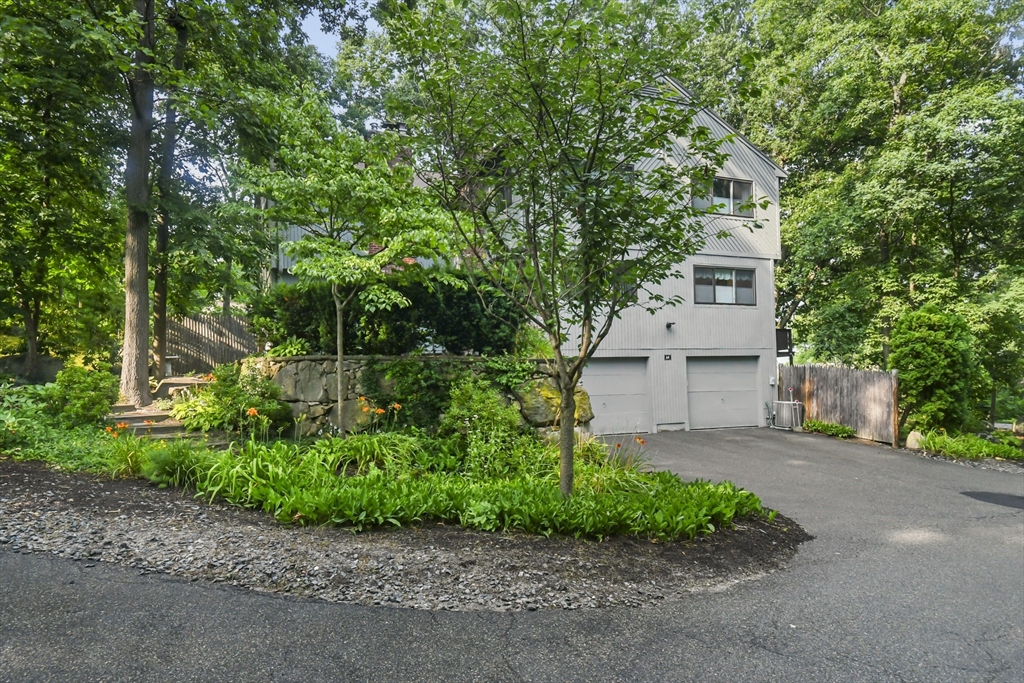 64 Mountain Gate Road, Unit 64 Ashland, MA 01721 - Photo 1 of 31 front view of a house with a street