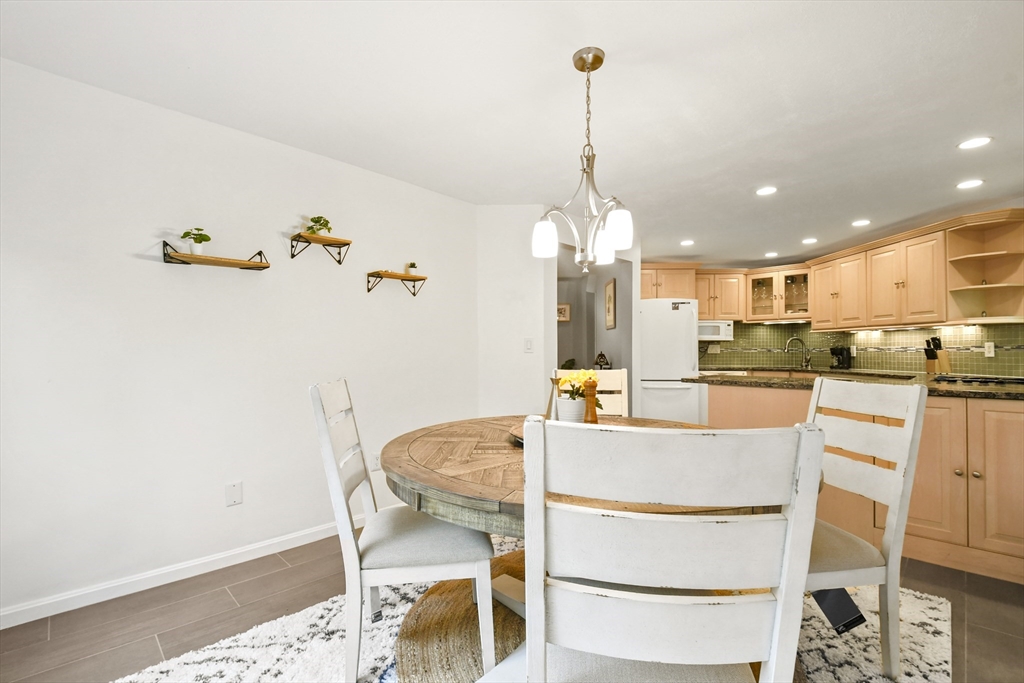 64 Mountain Gate Road, Unit 64 Ashland, MA 01721 - Photo 15 of 31 a view of a dining room and livingroom