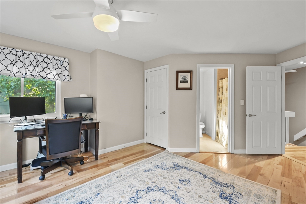 64 Mountain Gate Road, Unit 64 Ashland, MA 01721 - Photo 17 of 31 a view of a workspace with furniture and a window