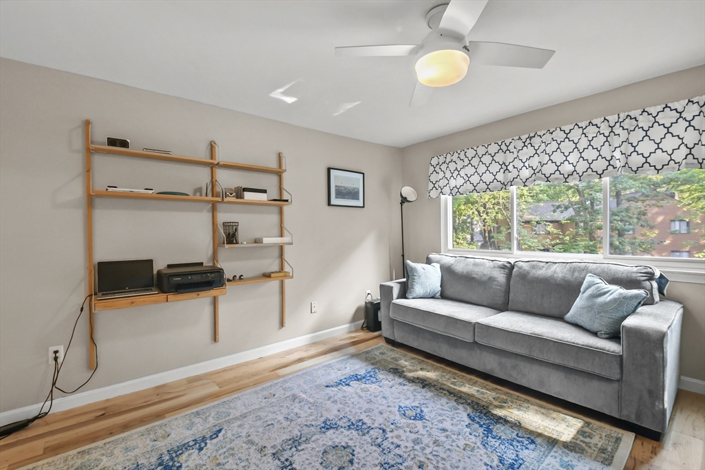 64 Mountain Gate Road, Unit 64 Ashland, MA 01721 - Photo 19 of 31 a living room with furniture and a window