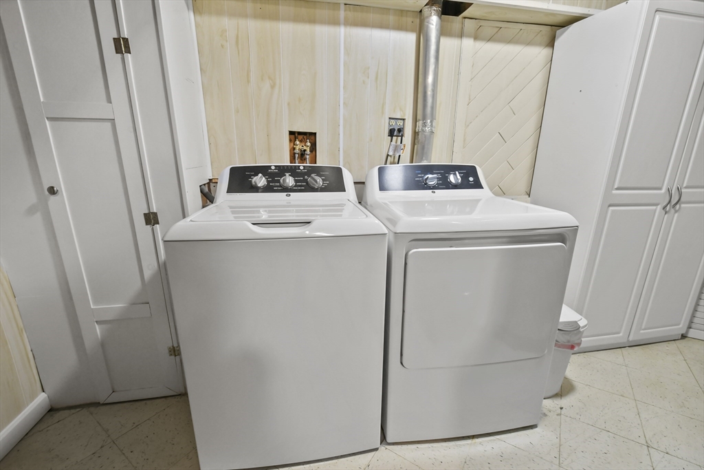 64 Mountain Gate Road, Unit 64 Ashland, MA 01721 - Photo 26 of 31 a utility room with dryer and washer