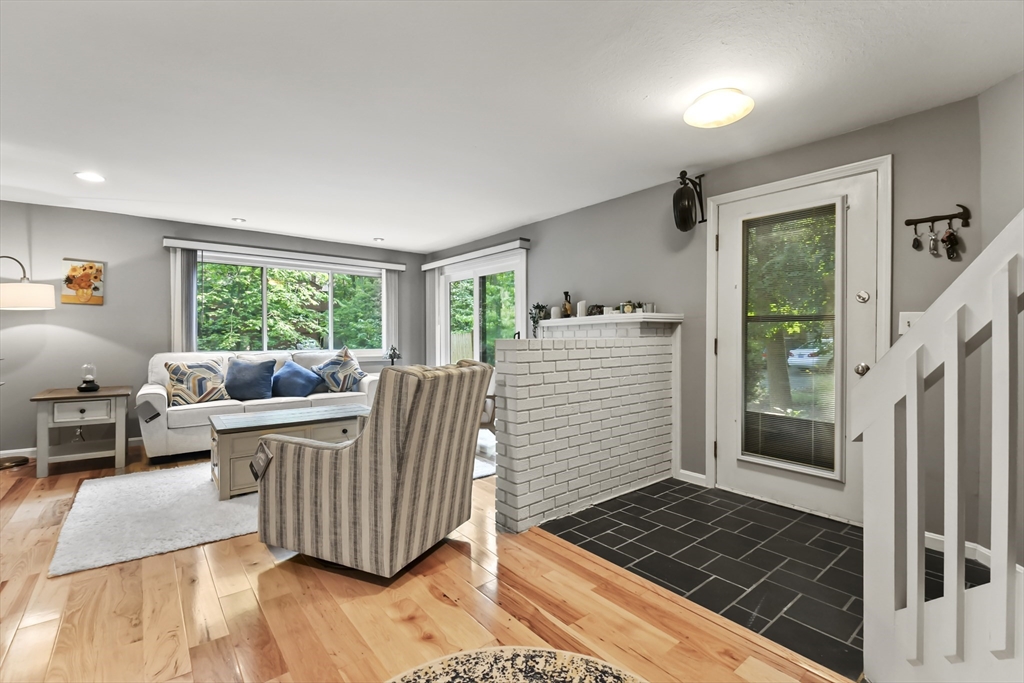 64 Mountain Gate Road, Unit 64 Ashland, MA 01721 - Photo 8 of 31 a living room with furniture and a window