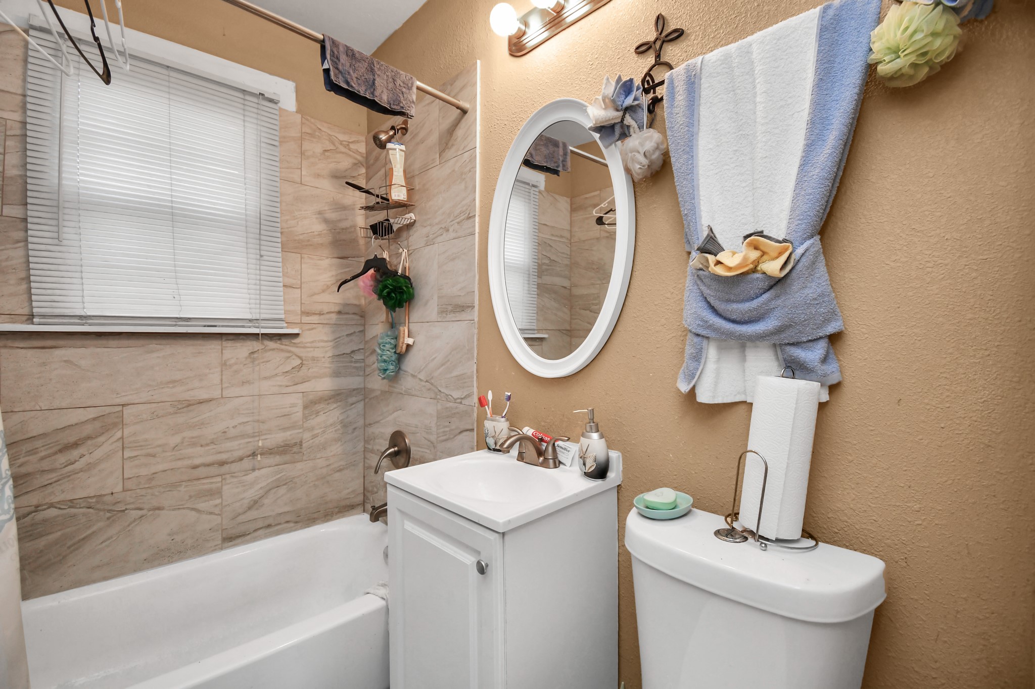 3818 Drew Street Houston, TX 77004 - Photo 26 of 35 a bathroom with a sink toilet and shower