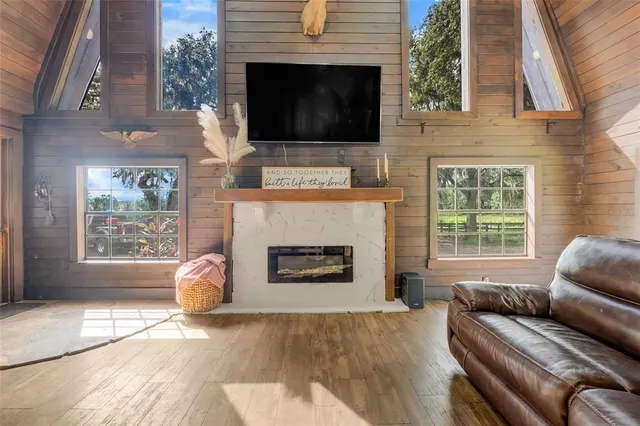 a view of kitchen with cabinets and wooden floor