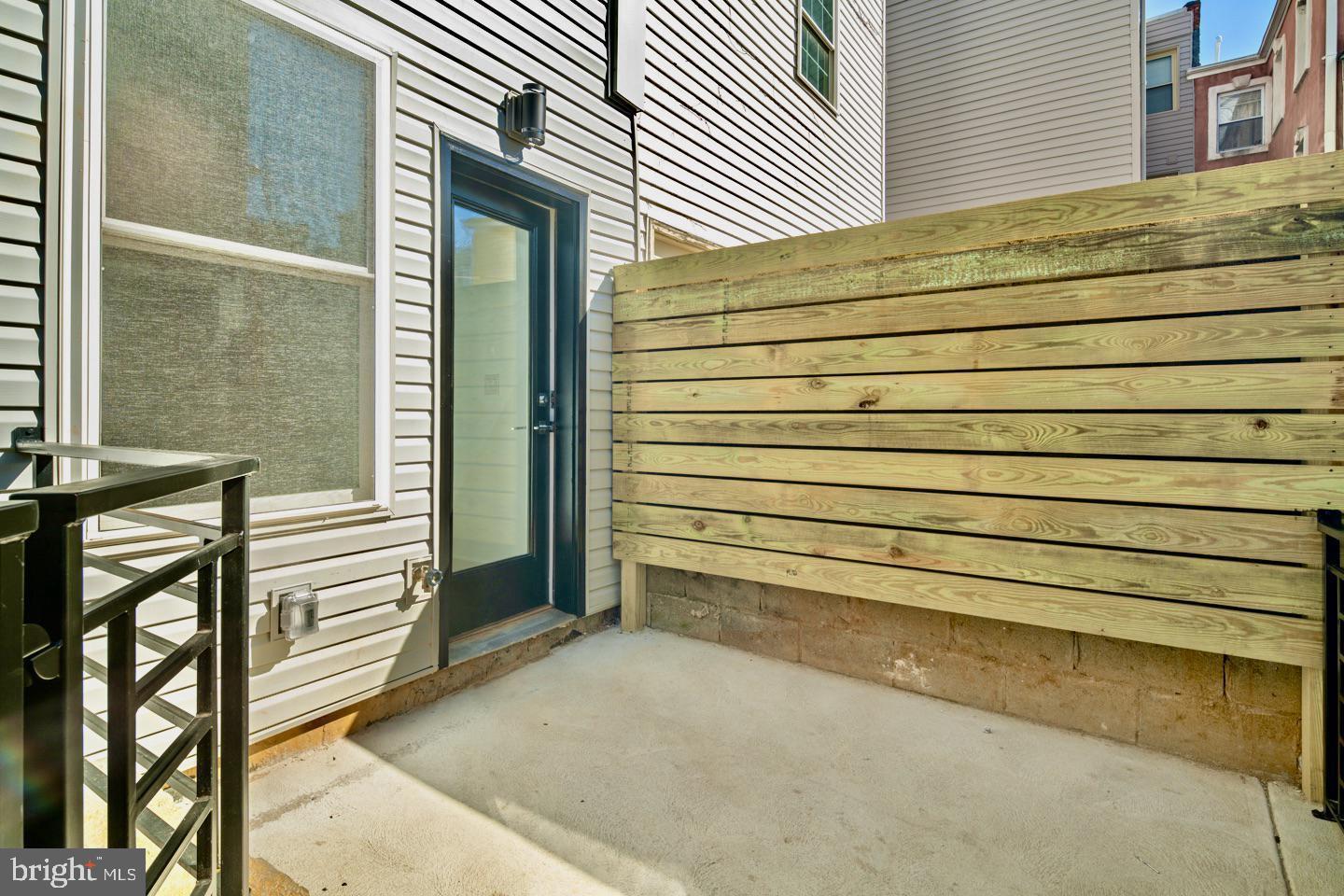 2006 Cambridge Street, Unit A Philadelphia, PA 19130 - Photo 16 of 17 a view of a house with a door and a window
