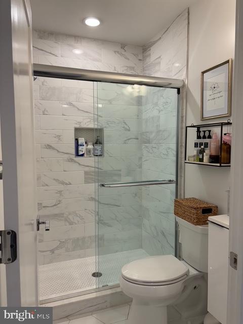 2006 Cambridge Street, Unit A Philadelphia, PA 19130 - Photo 5 of 17 a bathroom with a toilet and a shower