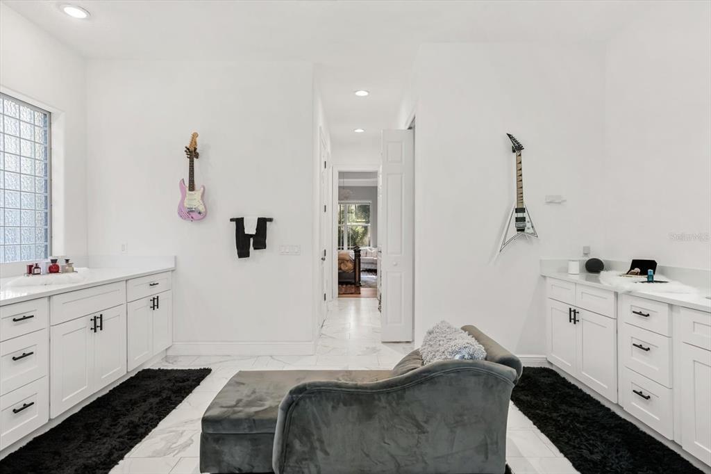 10370 Trout Road Orlando, FL 32836 - Photo 28 of 41 a bedroom with a bed and a dresser