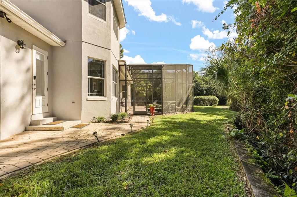 10370 Trout Road Orlando, FL 32836 - Photo 38 of 41 a view of a house with backyard and sitting area