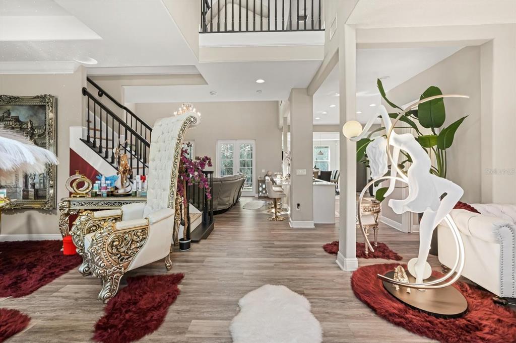 10370 Trout Road Orlando, FL 32836 - Photo 4 of 41 a living room with furniture and a wooden floor
