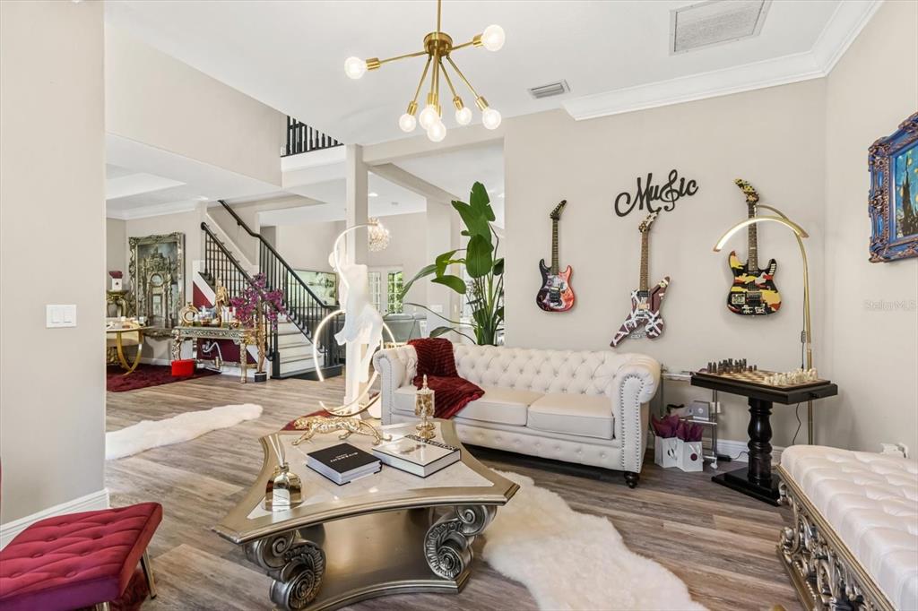 10370 Trout Road Orlando, FL 32836 - Photo 8 of 41 a living room with furniture and a couch
