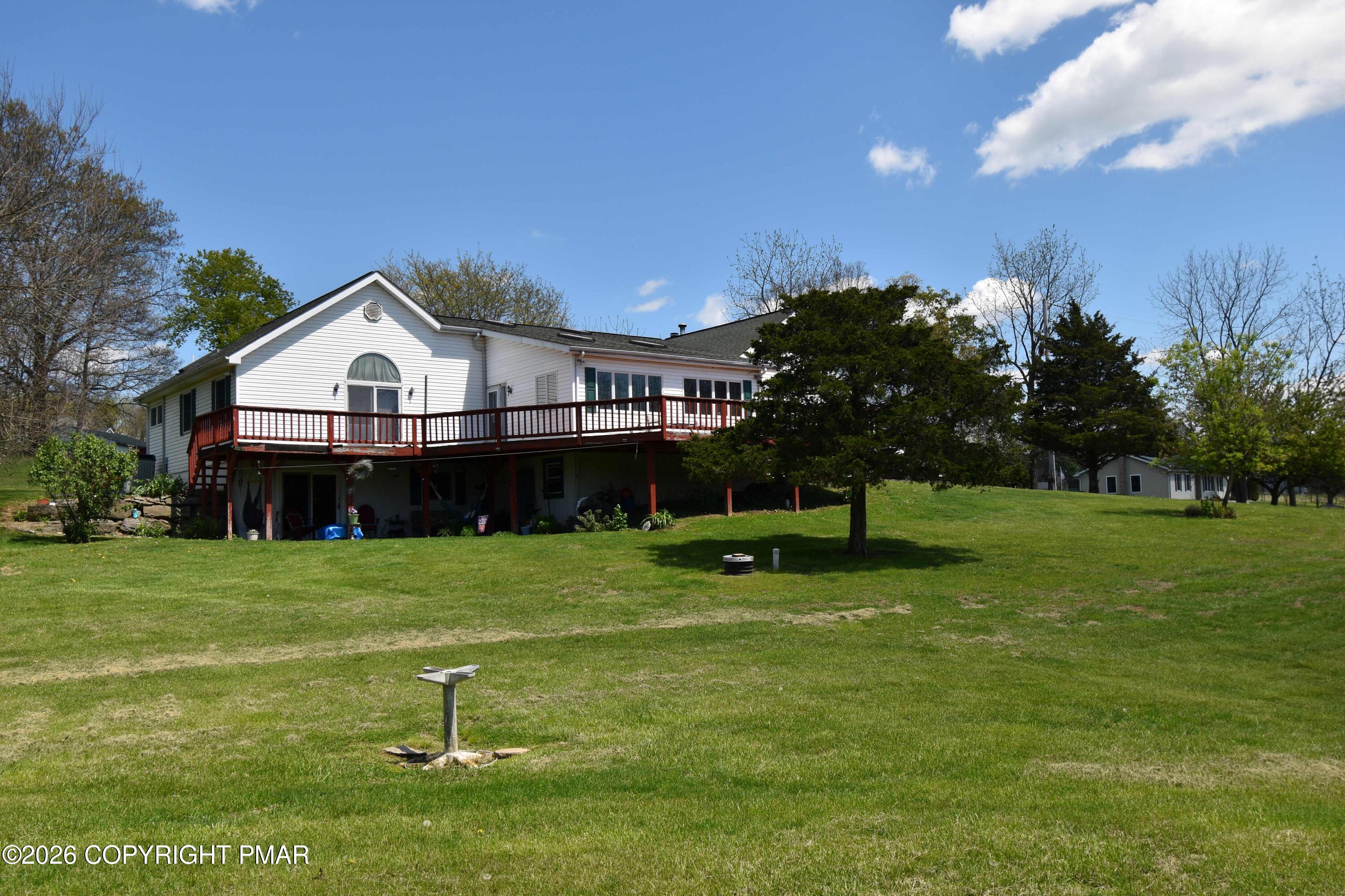 160 Quiet Valley Road Mount Bethel, PA 18343 - Photo 7 of 44 a view of a house with a yard