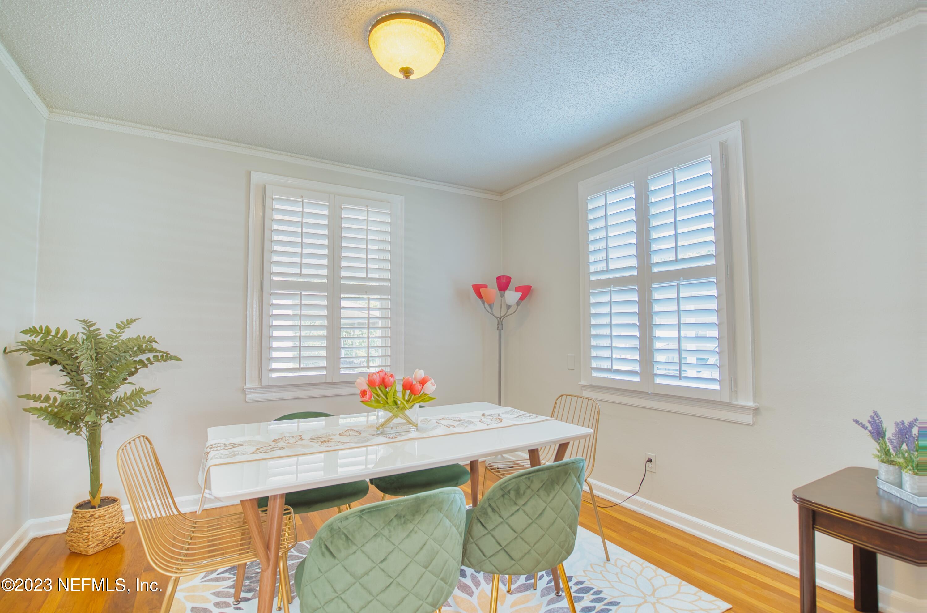 5344 Appleton Avenue Jacksonville, FL 32210 - Photo 13 of 44 a view of a dining room with furniture and a window