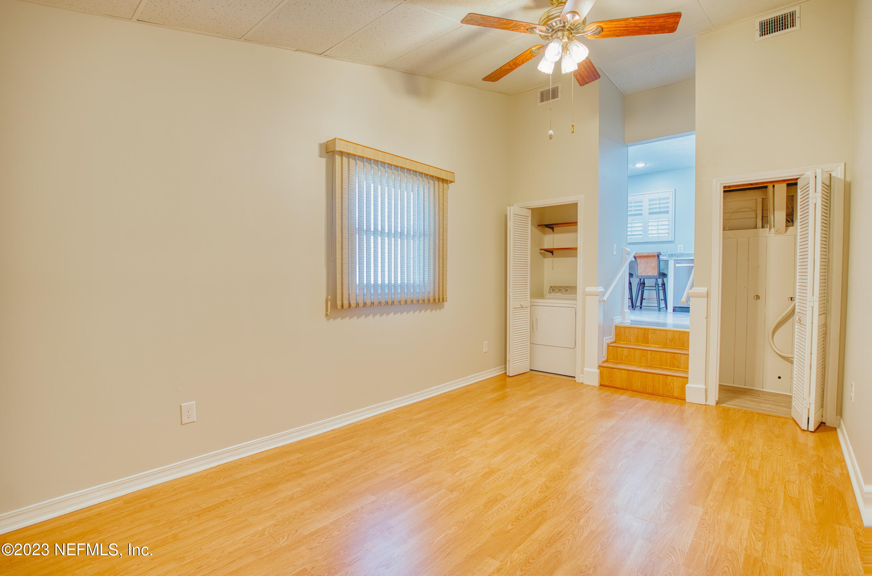 5344 Appleton Avenue Jacksonville, FL 32210 - Photo 26 of 44 a view of an empty room with window and wooden floor