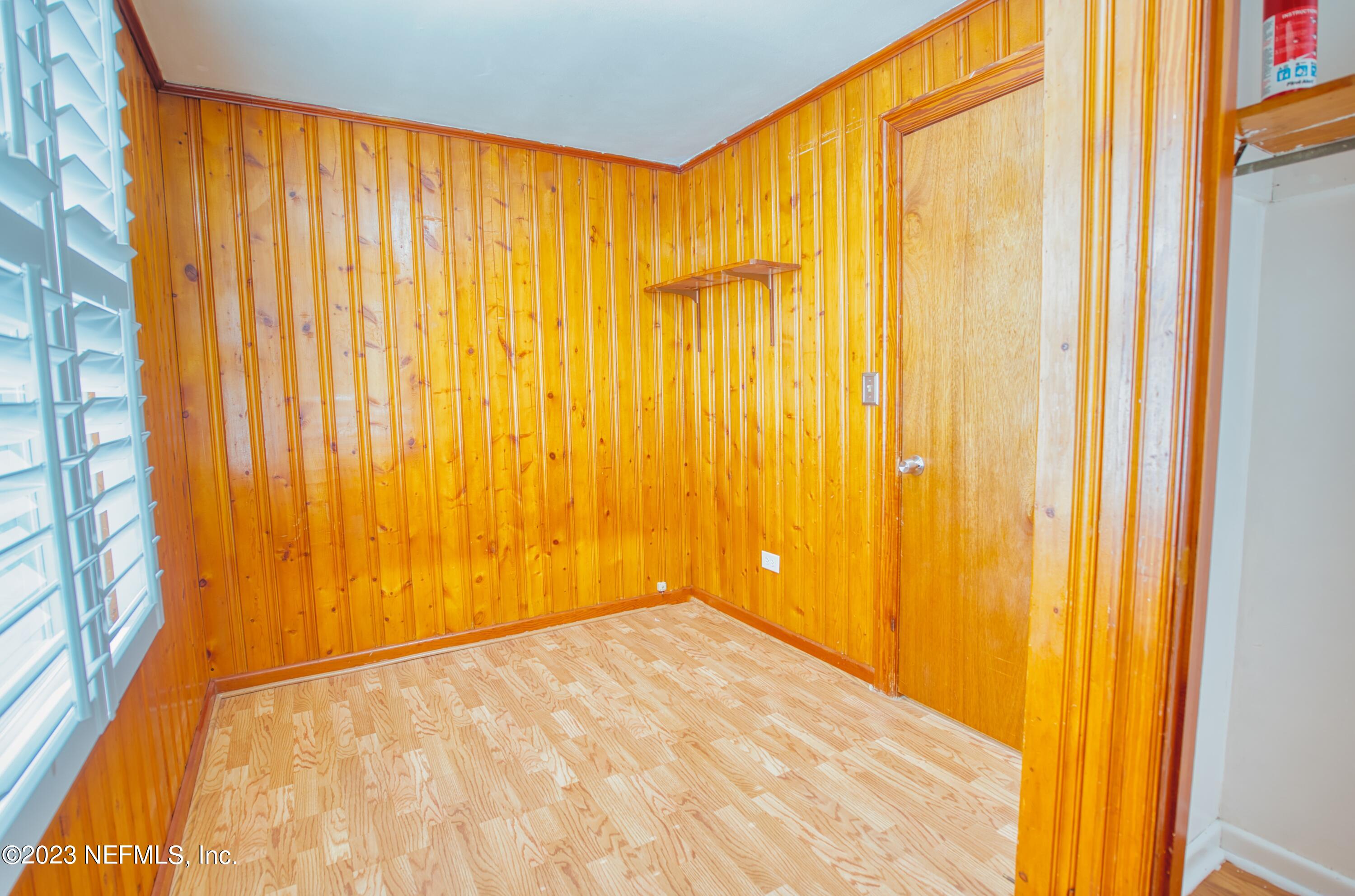 5344 Appleton Avenue Jacksonville, FL 32210 - Photo 31 of 44 a view of an empty room with a window and a door