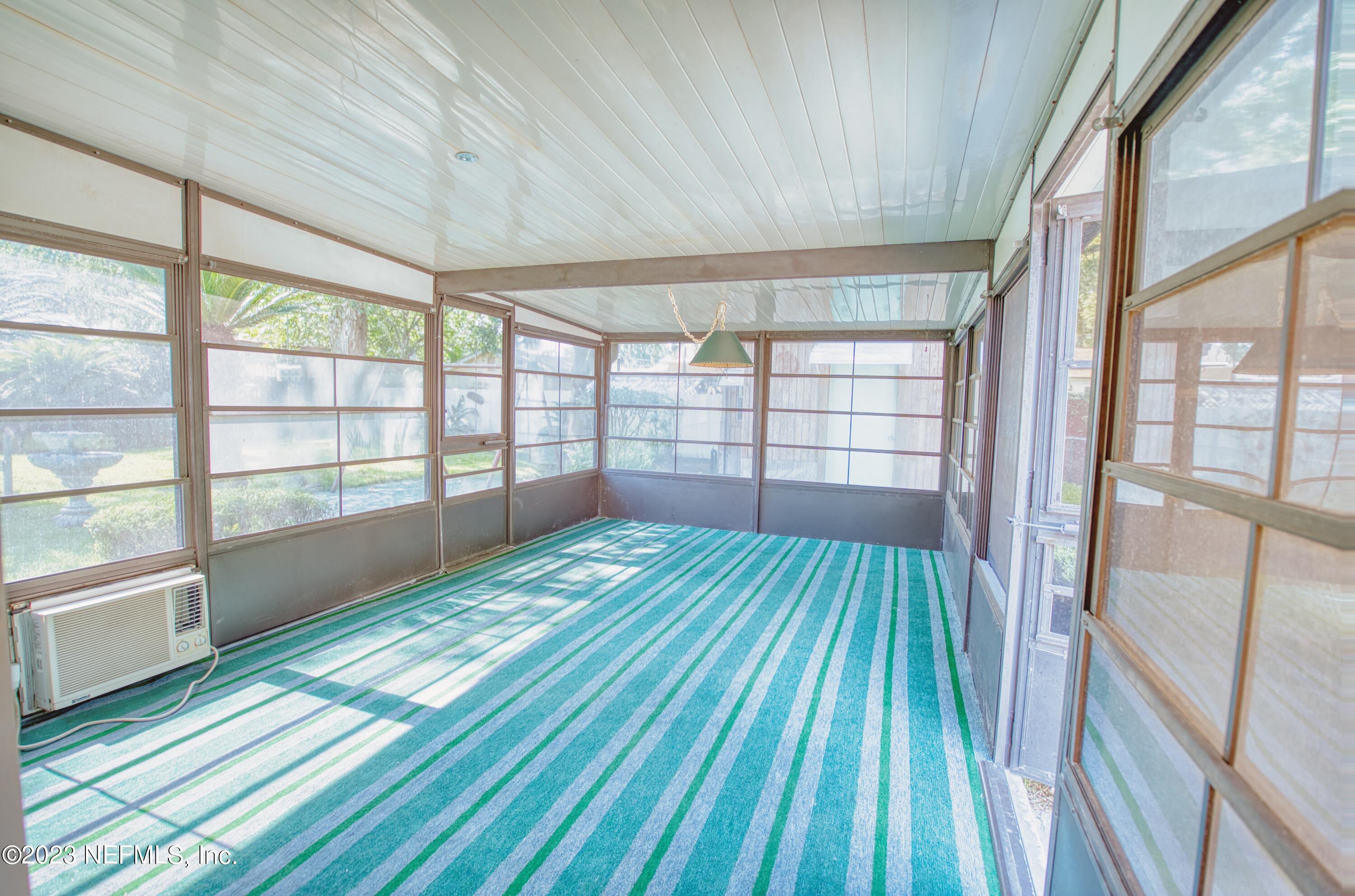 5344 Appleton Avenue Jacksonville, FL 32210 - Photo 33 of 44 a view of outdoor space with wooden floor and windows