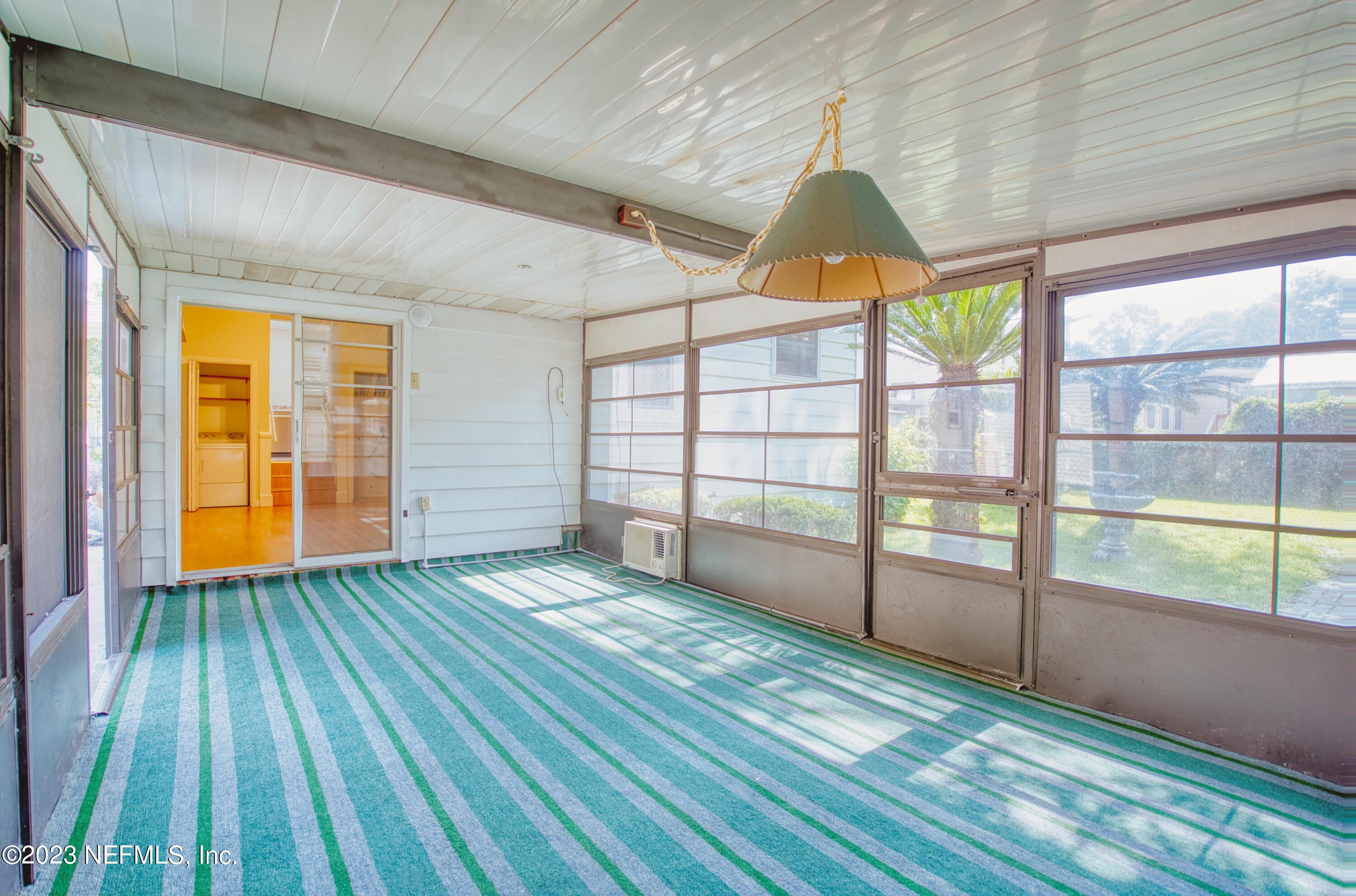 5344 Appleton Avenue Jacksonville, FL 32210 - Photo 34 of 44 a view of empty room with wooden floor and fan