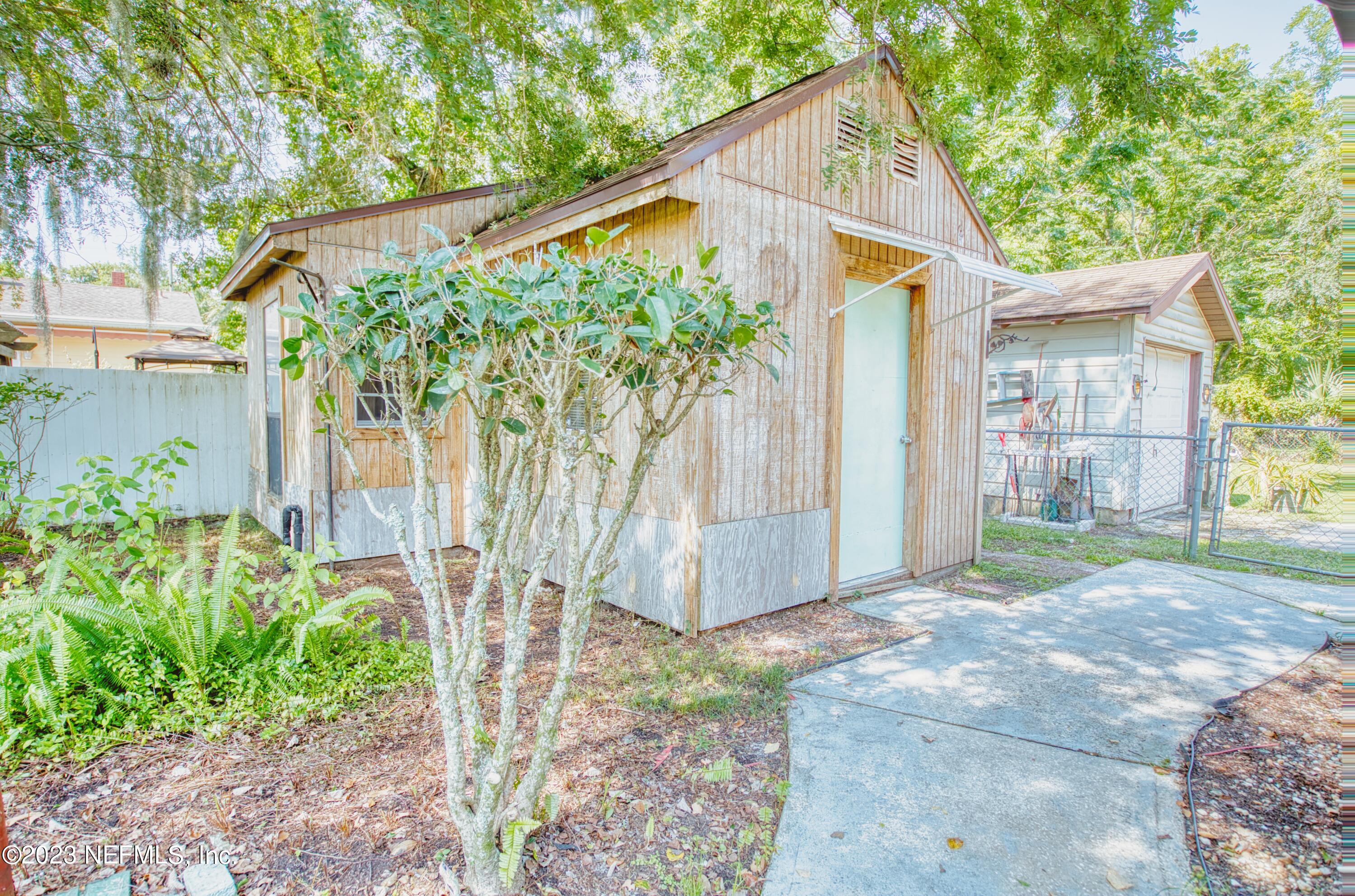 5344 Appleton Avenue Jacksonville, FL 32210 - Photo 38 of 44 a front view of a house with garden