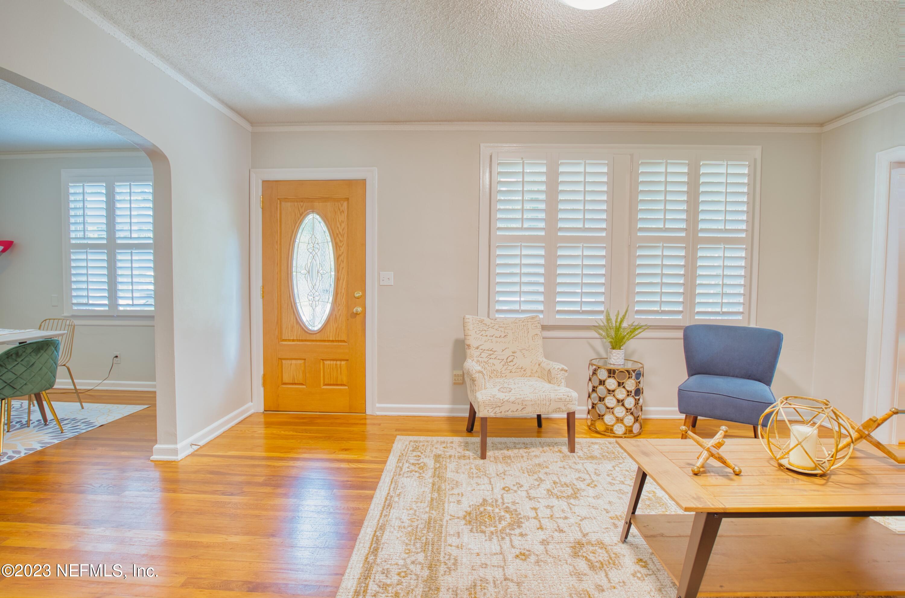 5344 Appleton Avenue Jacksonville, FL 32210 - Photo 4 of 44 a living room with furniture and wooden floor