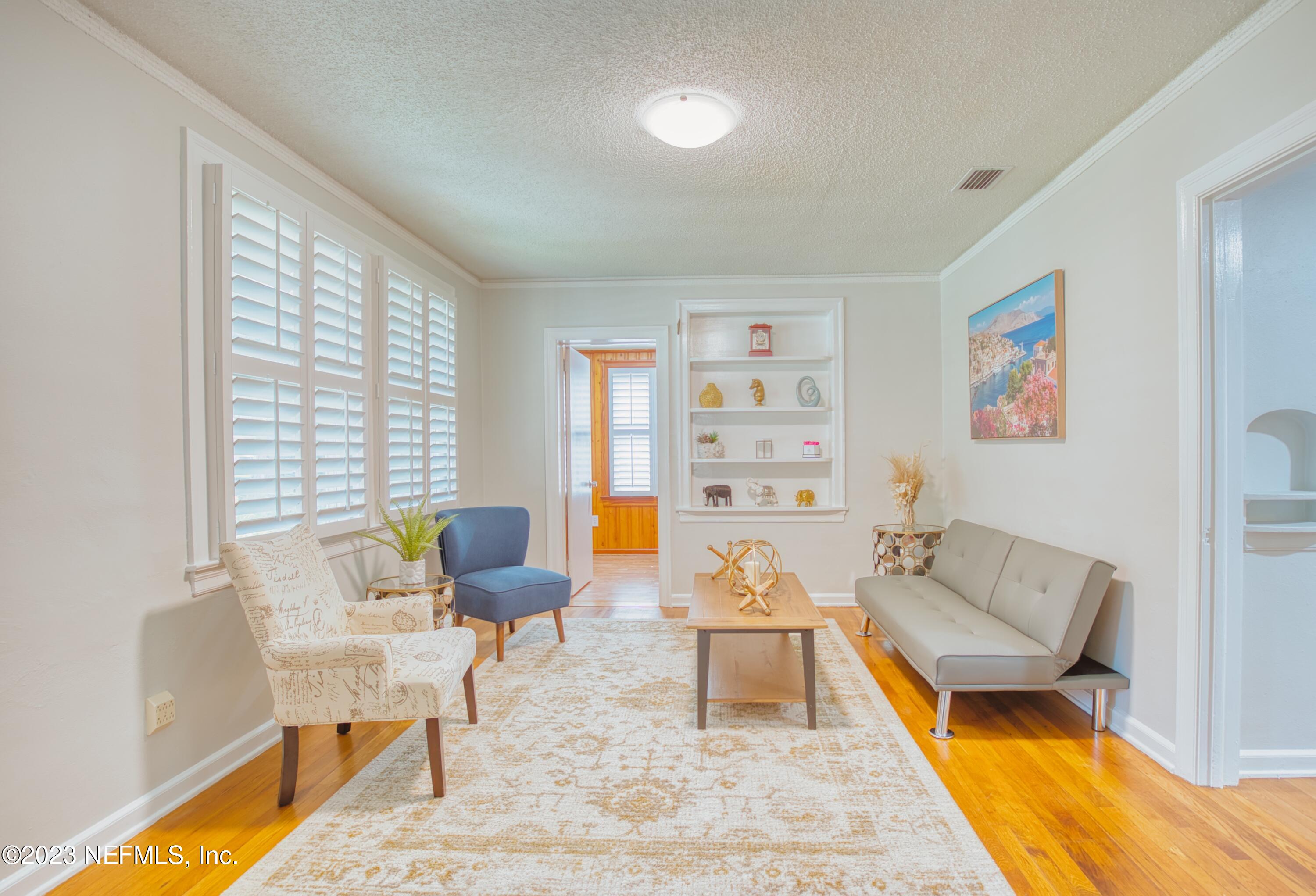 5344 Appleton Avenue Jacksonville, FL 32210 - Photo 6 of 44 a living room with furniture and a rug