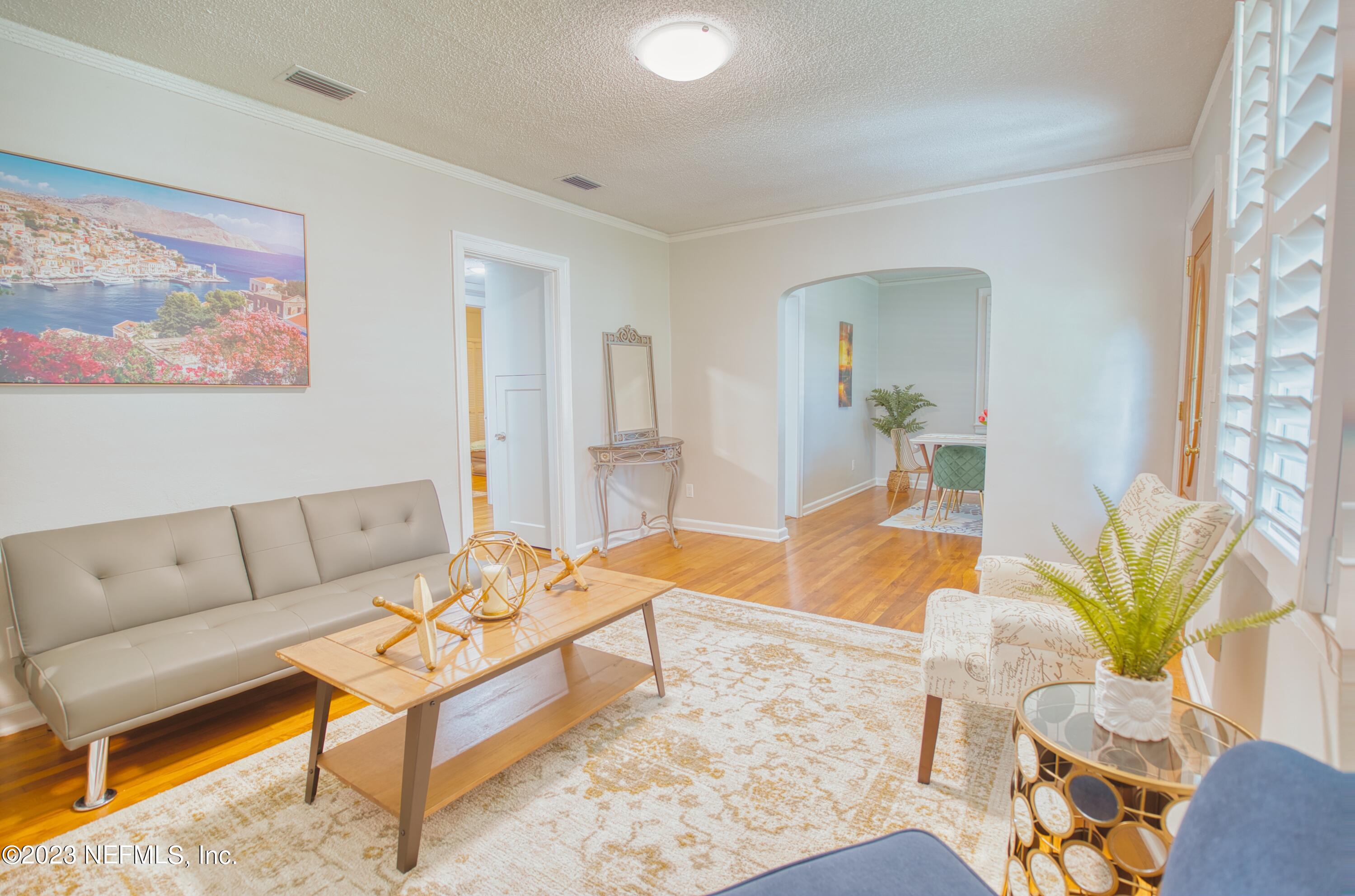 5344 Appleton Avenue Jacksonville, FL 32210 - Photo 7 of 44 a living room with furniture and a couch