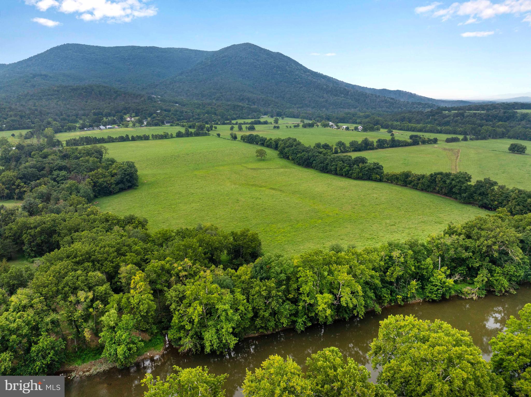 Lot 46 Strasburg Road Strasburg, VA 22657 - Photo 4 of 27 a view of a lush green hillside and a houses