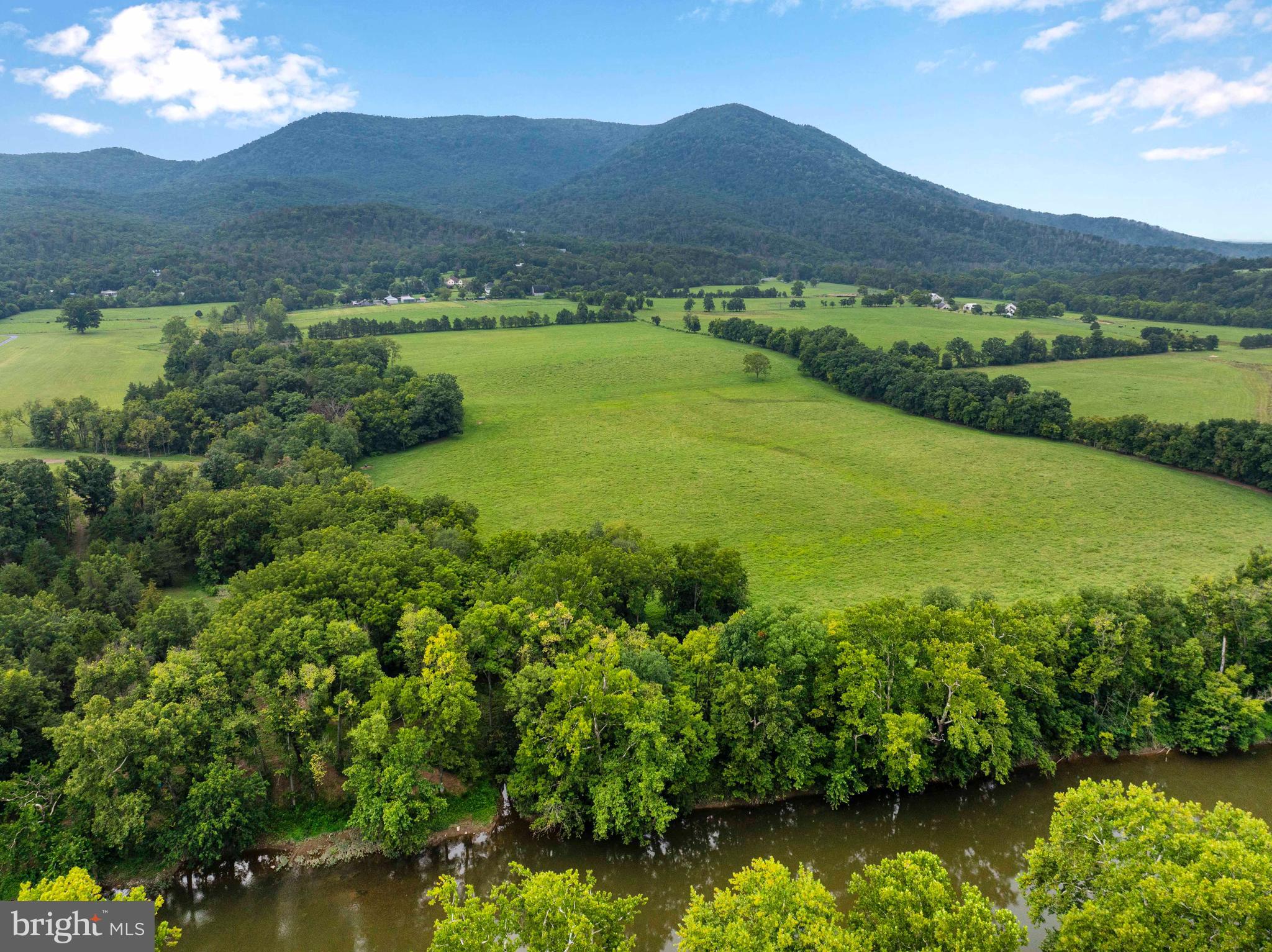 Lot 46 Strasburg Road Strasburg, VA 22657 - Photo 5 of 27 a view of a lush green hillside and a houses