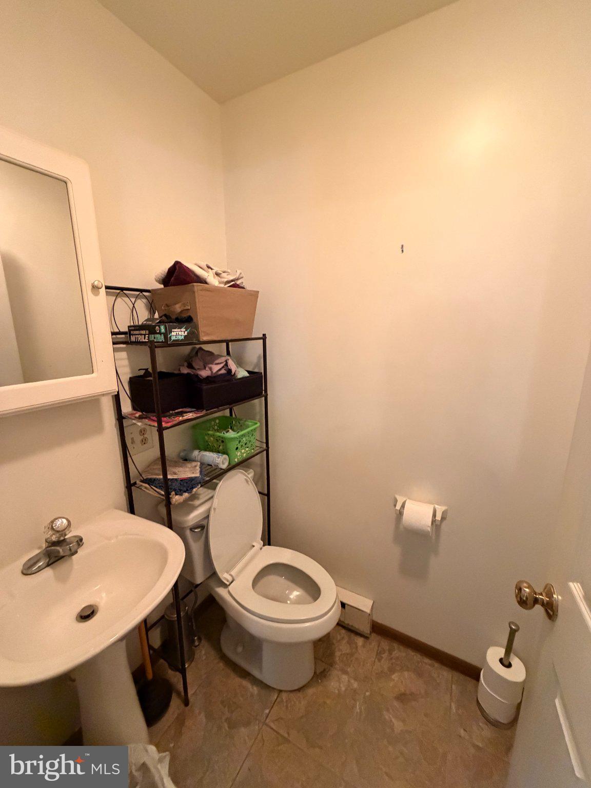 10 Taylor Drive, Unit J Reedsville, PA 17084 - Photo 5 of 11 Compact and functional bathroom space.